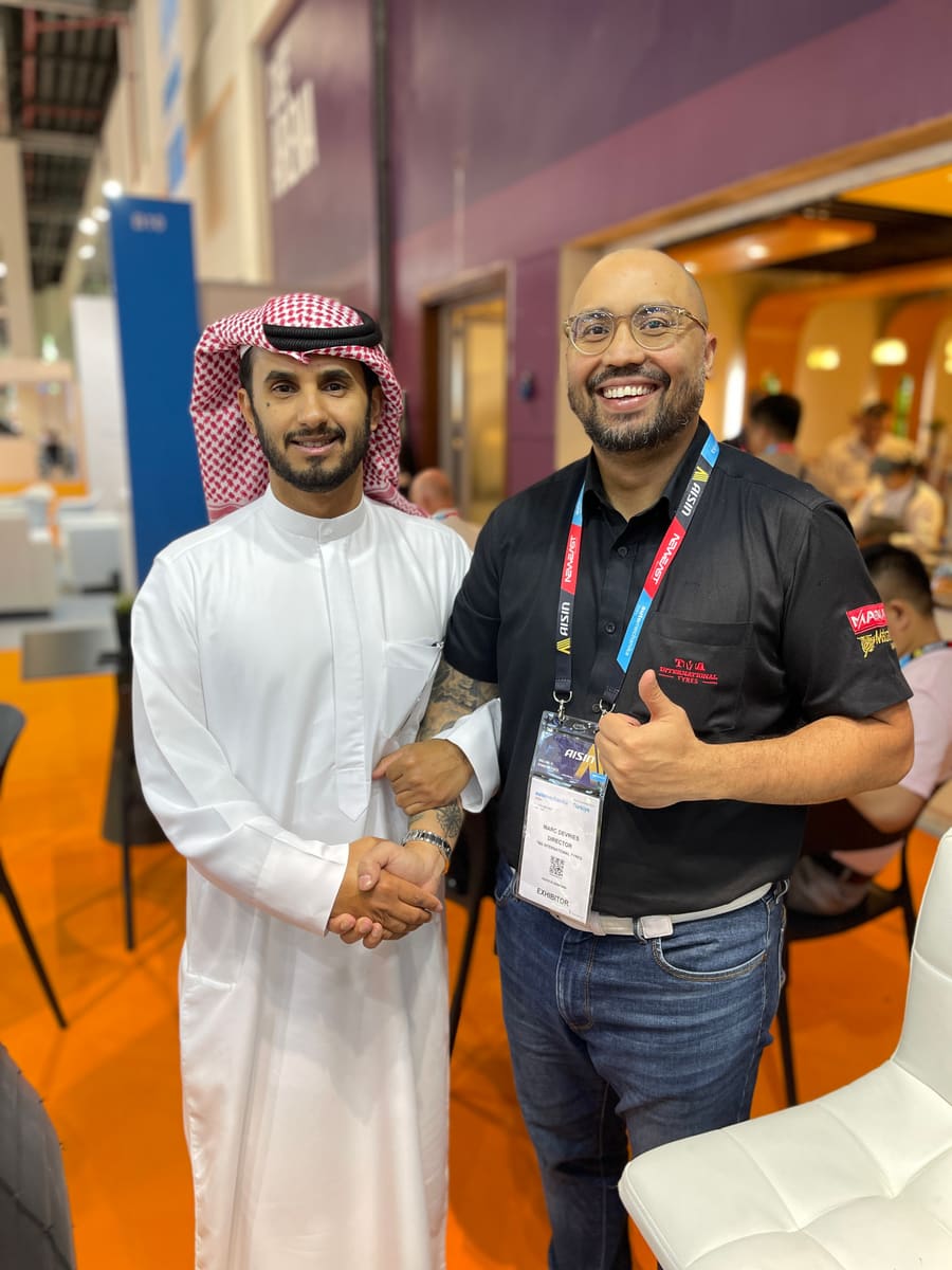 Handshake with a visitor at the MAGMA stand
